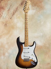 The FENDER Stratocaster guitar.